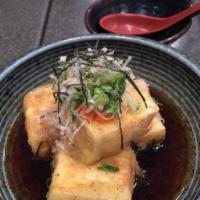 Agedashi Tofu · Lightly Fried tofu with bonito flakes on top.