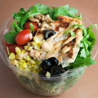 Salmon Salad · Mixed greens, baked chipotle salmon, olives, walnuts, corn and grape tomato with orange ging...