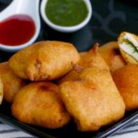 Paneer Pakoda · Chickpea flour vegetables, spices, herbs and cheese.