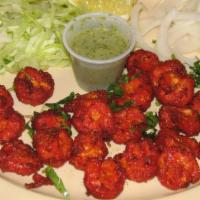 Shrimp Koliwada · Shrimp marinated in authentic Indian red masala.