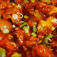 Chili Chicken gravy · Comes with basmati rice on the side