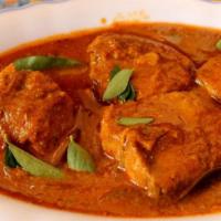 Fish Moulli Curry · South Indian specialty fish curry. Comes with basmati rice on the side.