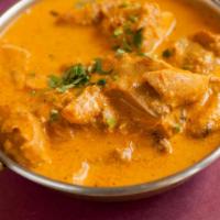 Shahi Chicken Korma · Boneless chicken cooked in our special saffron and cashew nut sauce. Comes with basmati rice...