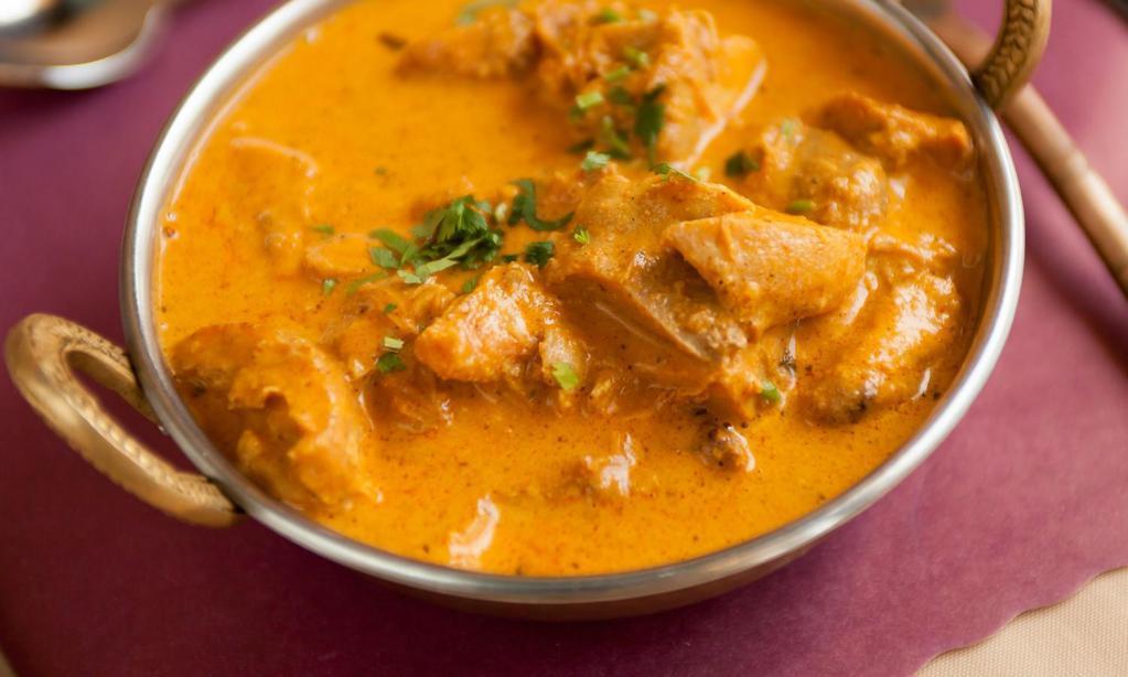 Shahi Chicken Korma · Boneless chicken cooked in our special saffron and cashew nut sauce. Comes with basmati rice on the side.