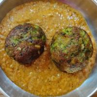 Spinach Kofta Curry · Cottage cheese and spinach dumplings simmered in spinach sauce. Comes with basmati rice on t...