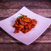 302. Golden Sesame Chicken · Selected chicken breast deep-fried until crisp then stir-fried with wine sauce and sprinkled...
