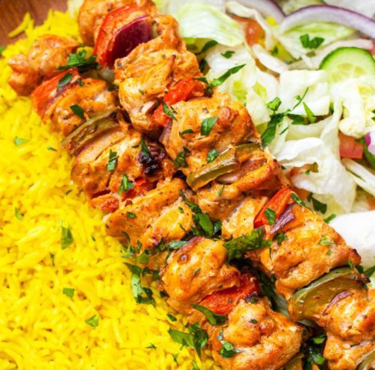 Chicken Kabab Combo · 2 skewers. Cooked on a skewer. Served with 2 sides of your choice (rice. hummus, salad or fries).