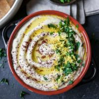 Baba Ghannouj · Levantine appetizer of Lebanese origin consisting of mashed cooked eggplant, olive oil, lemo...