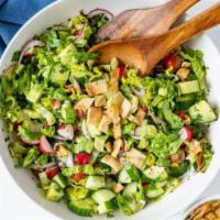 Fattoush Salad · Levantine salad made from toasted or fried pieces of khubz (Arabic flat bread) combined with...
