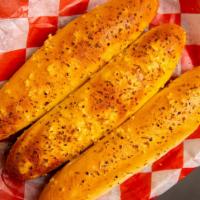 Garlic Bread Sticks · Get Your Taste Buds Ready with this Time-Honored Classic Italian Appetizer! Our Garlic Bread...