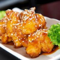 Sesame Chicken  · Crispy white chicken in chef's special sweet sauce. Served with white rice. 