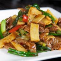 Mongolian Beef  · Sliced beef with peppers, onion in chef's special spicy sauce. Served with white rice. Hot a...