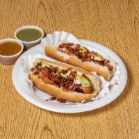 Mexican Hot Dog · Bacon, onion, tomatoes, mustard, mayo, salsa and ketchup.