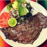 Bistec el Mariachi · Steak house's style with cactus salad served with rice and beans ,and tortillas or bread.