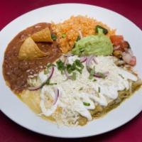 Enchiladas Verdes (3) · Green Enchiladas. Three corn tortillas filled with your choice of meat & sauce topped with g...