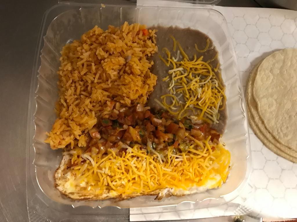 Huevos Rancheros Breakfast Plate · Two eggs with cheese on top, Mexican Salsa, Rice and beans with cheese, and tortillas on the side.