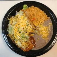 #5. Beef Taco & Enchilada Combination · 1 Crispy shredded chicken taco (lettuce and cheese). 1 enchilada choice of shredded beef (co...