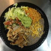 #19 Grilled Chicken · Chopped Grilled Chicken, Pico De Gallo, Guacamole, Lettuce, Rice and Beans with cheese on th...