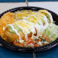 Special #4. Chimichanga · Your choice of shredded chicken, or ground beef, or shredded beef cooked with veggies. Beans...