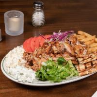 Chicken Gyro Platter · Chicken, house sauce, tzatziki, tomatoes, onions, lettuce, and french fries or rice.