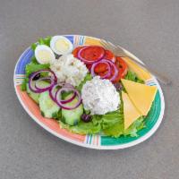 Cold Plate  · Chicken or tuna salad with potato salad, cheese, egg, tomato, cucumber, onion, and olives.
