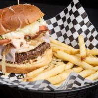 Famous Verdolaga Hamburger · 8 oz. beef burger, ham and chicken breast. Served with mozzarella cheese, bacon, smashed pot...