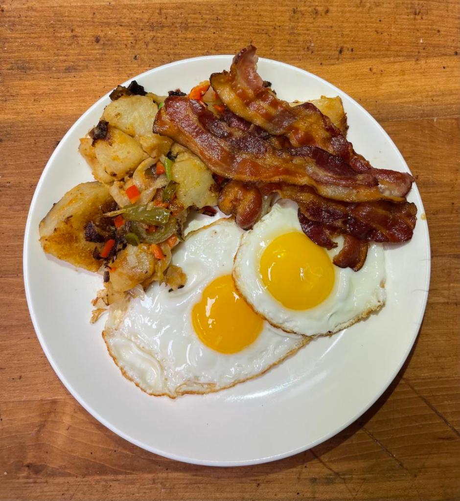 Hungry Man Plate · Comes with 3 eggs, cheese, homefries, toast and your choice of protein: ham, sausage or bacon.

