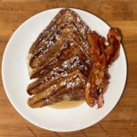  French Toast Order · Served with maple syrup and butter.