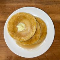 Golden Brown Pancakes · Buttermilk pancakes served with maple syrup and butter.