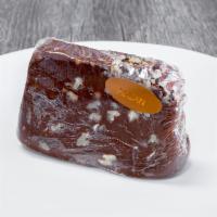 Pecan Fudge -Chocolate · Half-pound slice of rich, smooth, and creamy chocolate fudge mixed with fresh pecans.