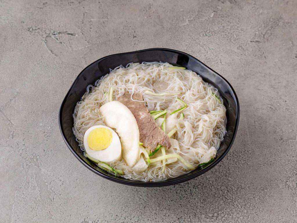 Mul Naengmyun · Buckwheat vermicelli noodles in home made beef broth served cold.