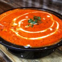 Paneer Butter Masala · Homemade cottage cheese cooked in a clay oven then sauteed in a creamy butter sauce.