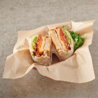 5. Turkey Club Sandwich · Triple decker. Turkey, bacon, lettuce, tomato and mayo. Served on white toast.