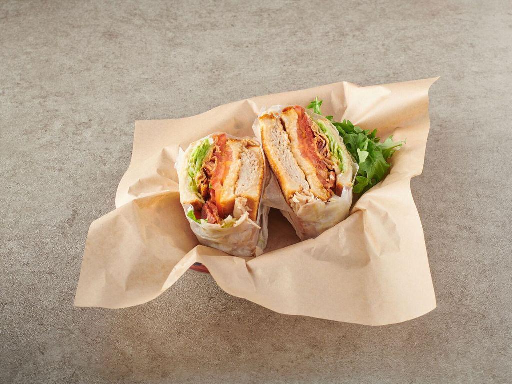 5. Turkey Club Sandwich · Triple decker. Turkey, bacon, lettuce, tomato and mayo. Served on white toast.