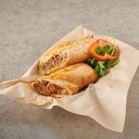 9. Philly Cheese Steak Sandwich · Roast beef, melted Swiss cheese, onion, green pepper and red pepper. Served on toasted hero ...