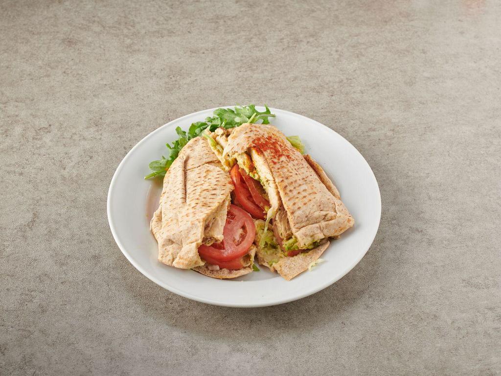 45. Big Apple Sandwich · Grilled chicken, avocado, lettuce, tomato and hummus. Served on a pita. 