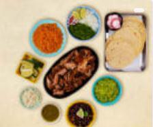Build Your Own Carnitas Taco Kit · 1 lb. of protein, 12 hand-made corn tortillas, Mexican rice, chopped onions, cilantro, shred...