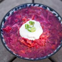 Red Borscht · Beef soup and topped with sour cream and dill.