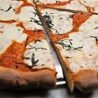 Fresh Mozzarella Pizza · Plum tomatoes, fresh basil and fresh mozzarella.