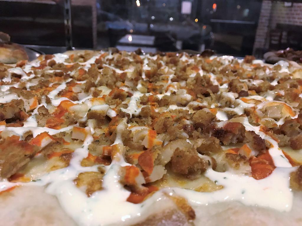 Buffalo Chicken Pizza · Chicken, ranch dressing and hot sauce.