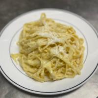Fettuccine Alfredo · Classic prepared with butter, heavy cream and parmigiana cheese.