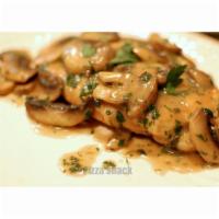 Chicken Marsala · Boneless chicken sauteed in marsala wine and topped with mushrooms.