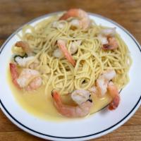 Shrimp Scampi · Fresh shrimp sauteed in olive oil, garlic, white wine and lemon juice.