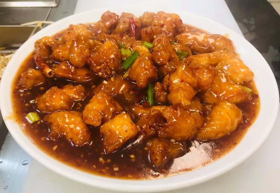 General Tsou's Chicken  · Cripsy deep fried dark meat chicken in a tangy, psicy golden brown sauce. Spicy.