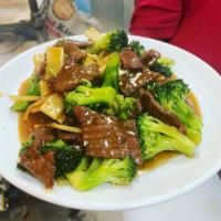 Broccoli Beef  · Tender beef slices sauteed with broccoli and bamboo shoots in the chefs brown sauce.