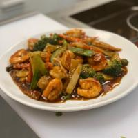 Hunan Shrimp  · An assortment of fresh vegetables and shrimp sauteed with white sauce. Spicy.