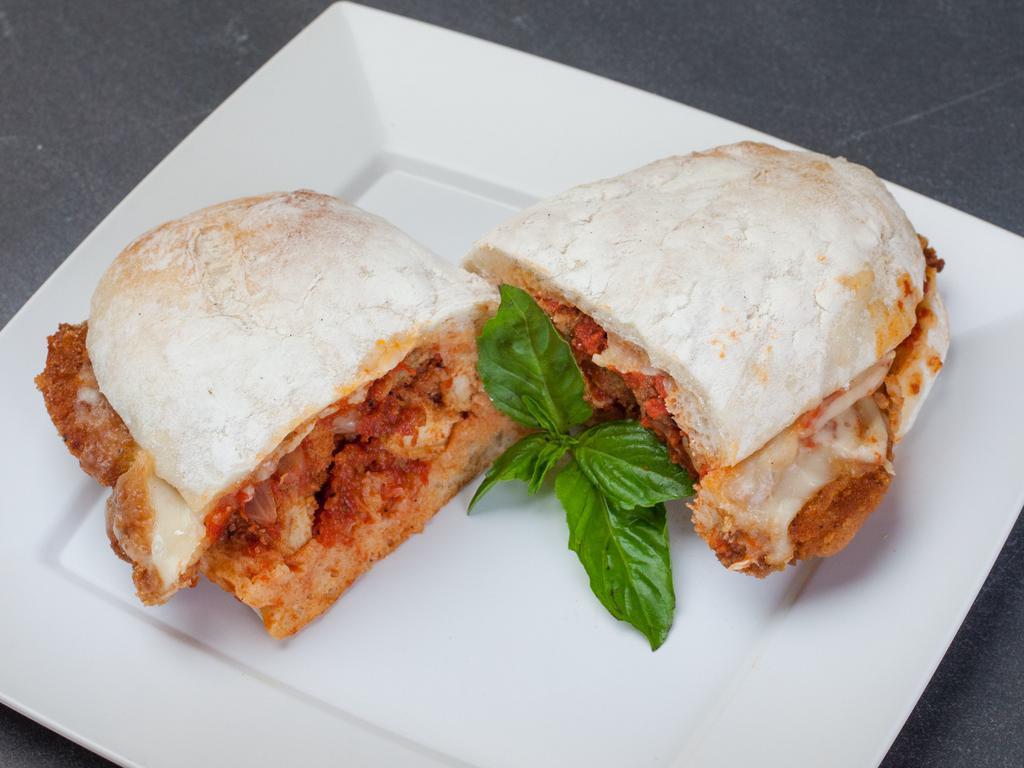 6. Chicken Parmesan Sandwich · Fry chicken,homemade tomato sauce and mozzarella cheese 