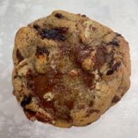 Dark Chocolate, Cherry, and Pecan Cookie · Our classic cookie dough with generous chunks of dark Belgian chocolate, dried cherries, and...