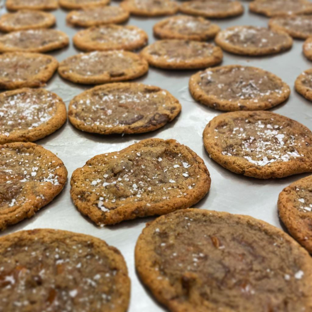 Dark Chocolate, Sea Salt, and Toffee Cookie · Our classic cookie with generous chunks of dark Belgian chocolate and house-made toffee topped with sea salt.