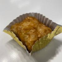 Baklava · Alternating layers of flaky pastry and ground nuts. Covered in a honey lemon glaze. 